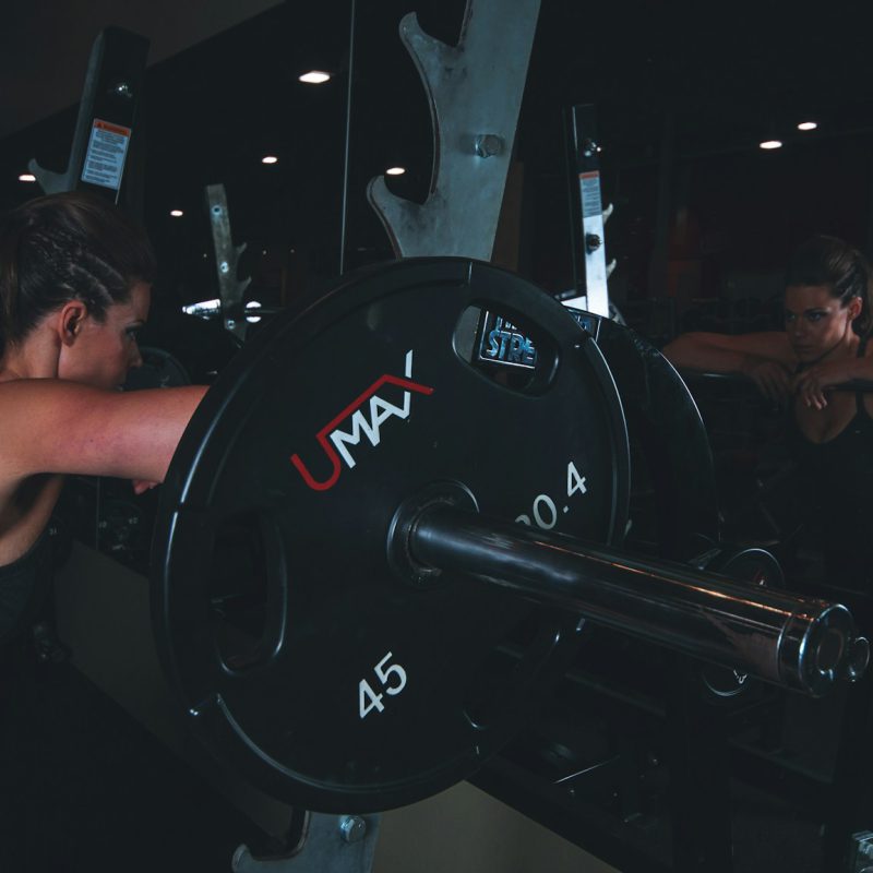 woman looking at mirror